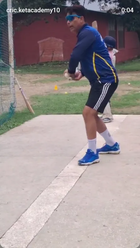 A cricketer working on batting footwork during a net session